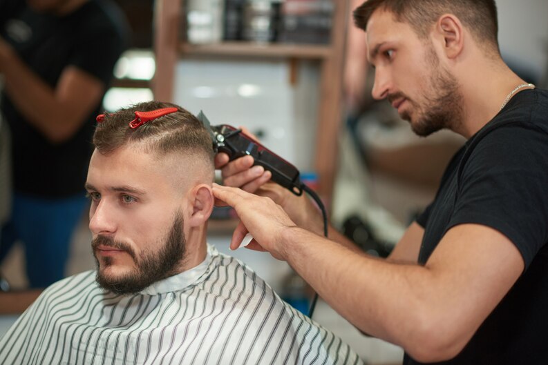  Haircuts that add width to the face shape should be avoided for round-faced men