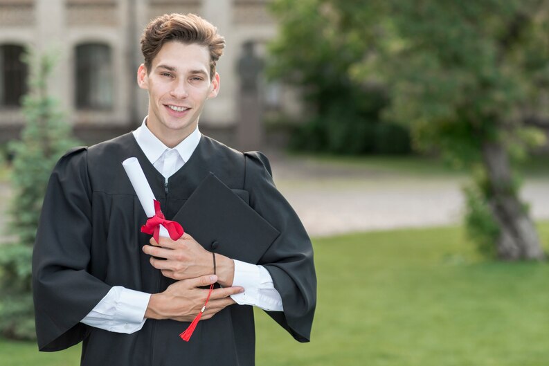 Well-groomed graduate preparing for his ceremony.