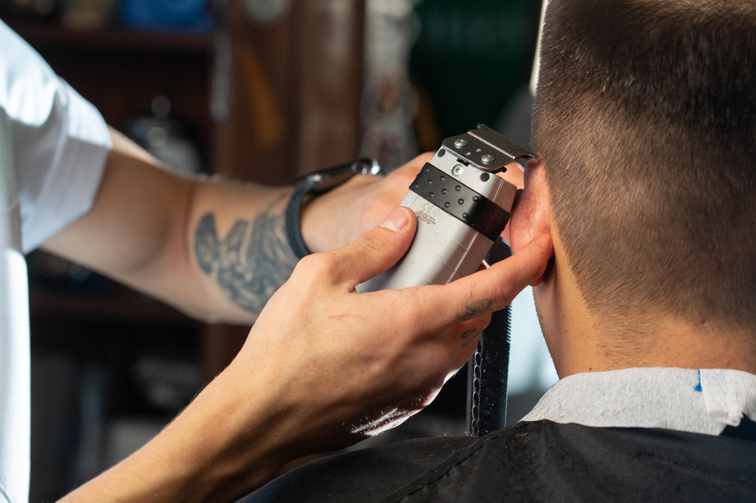 Barber doing medium fade